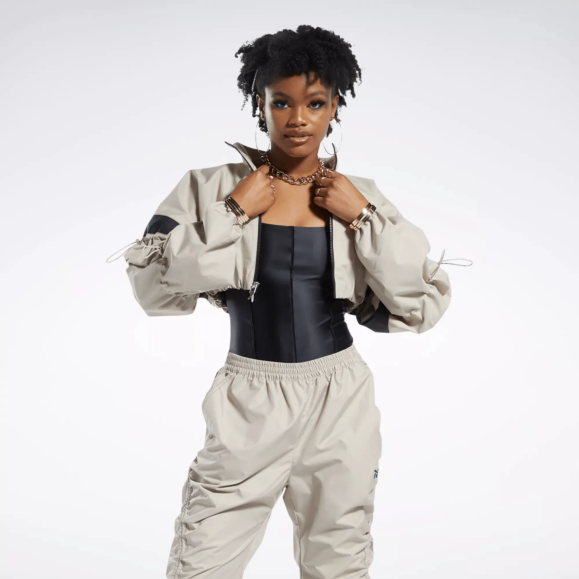 Reebok Damen Cardi B Gewebte Crop Jacke Beige Reebok
