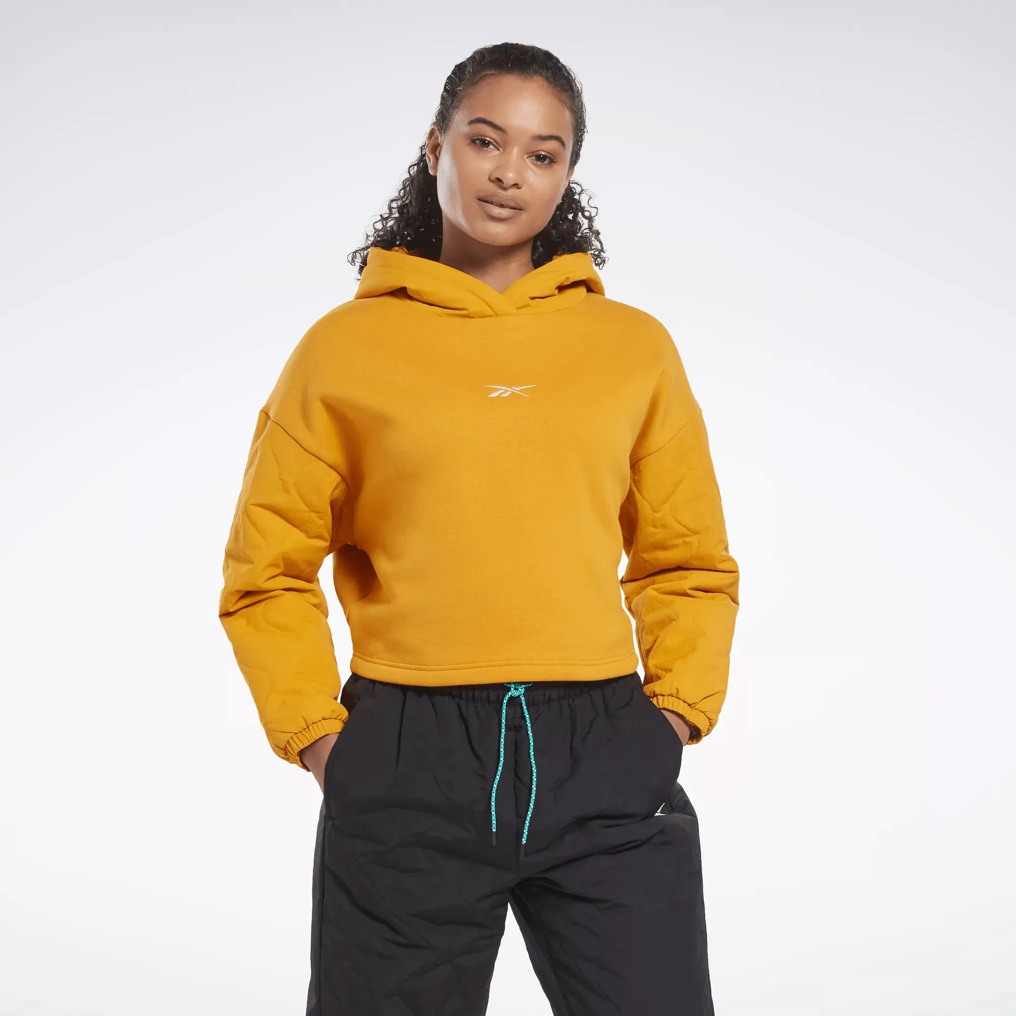 Reebok Damen THERMOWARM GRAPHENE Kapuzenpullover Gelb Reebok